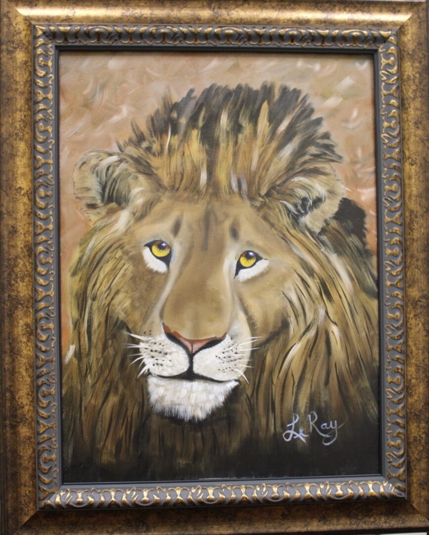 framed painting of Aslan the lion