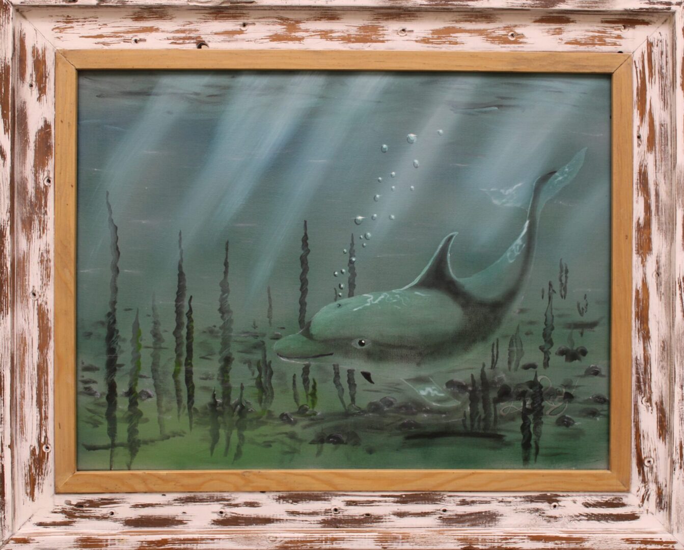 framed painting of a dolphin underwater with bubbles