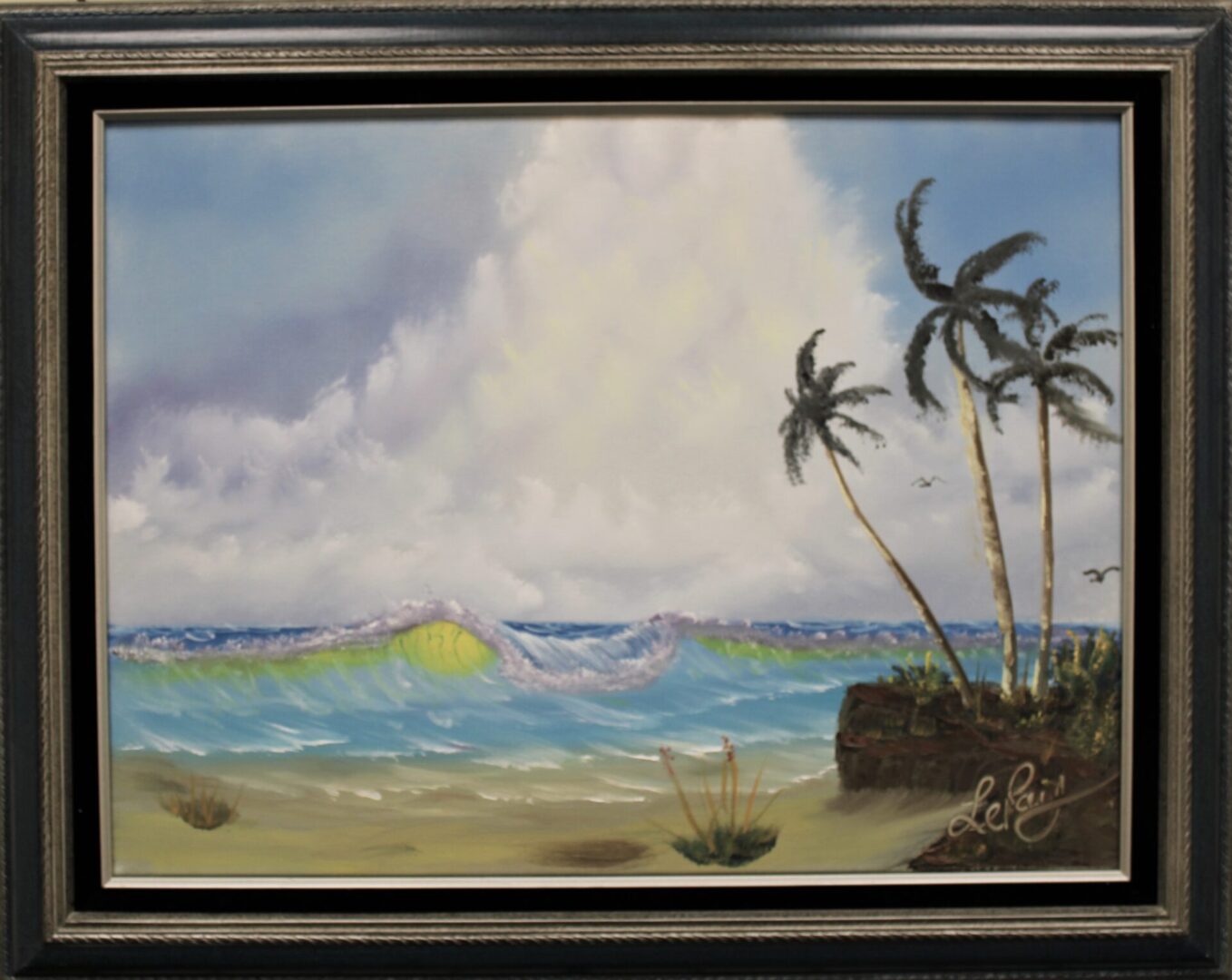 framed painting of beach with palm trees