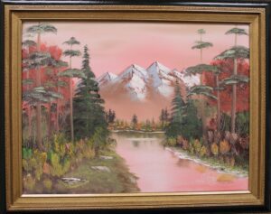 A painting of mountains and a river in an Autumn Fantasy frame.