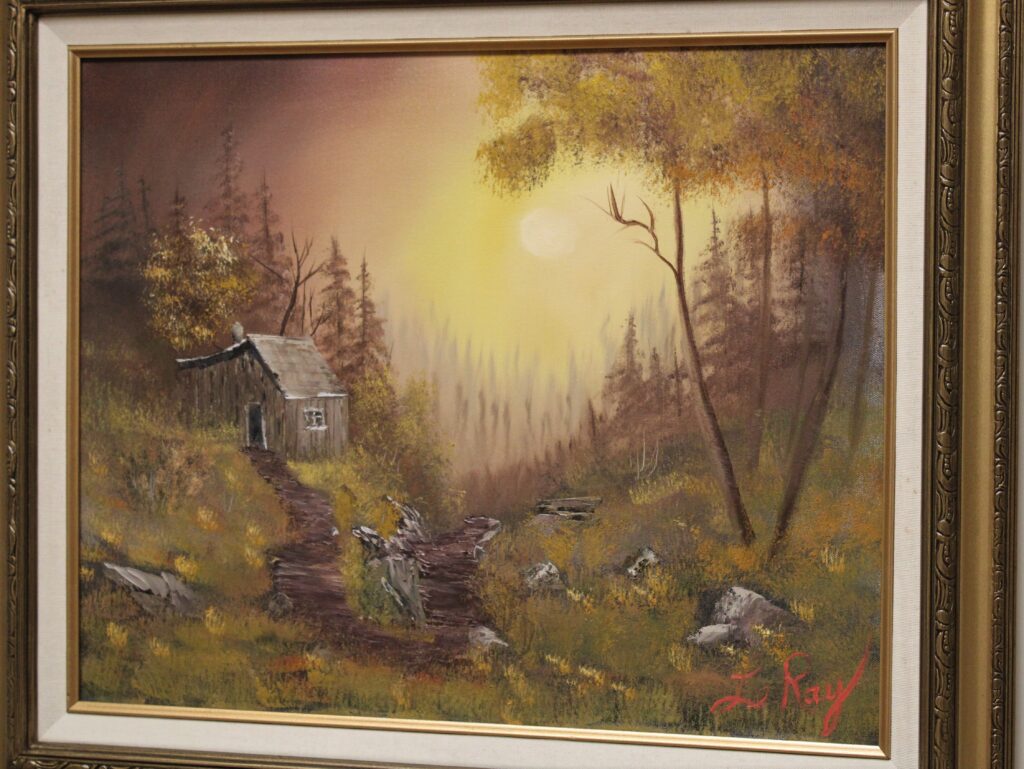 A painting of Autumn Glory in the woods.