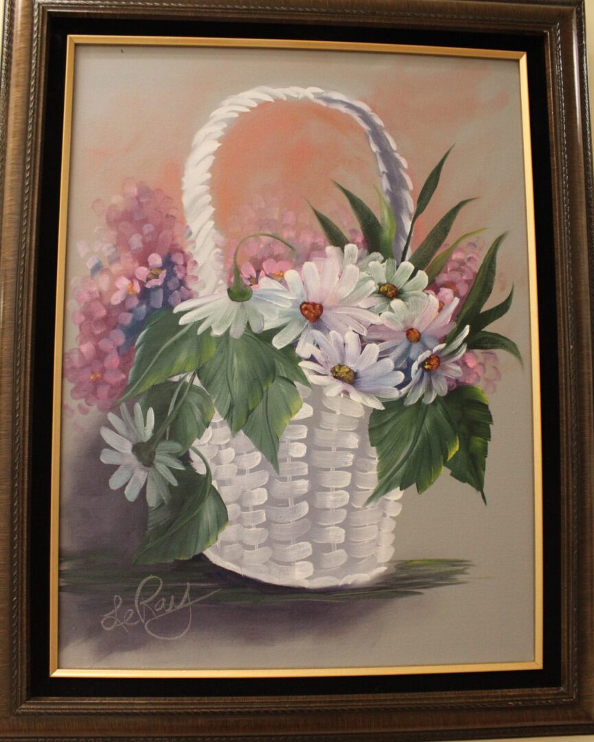 A painting of Daisies & Lilacs in white Basket in a frame.