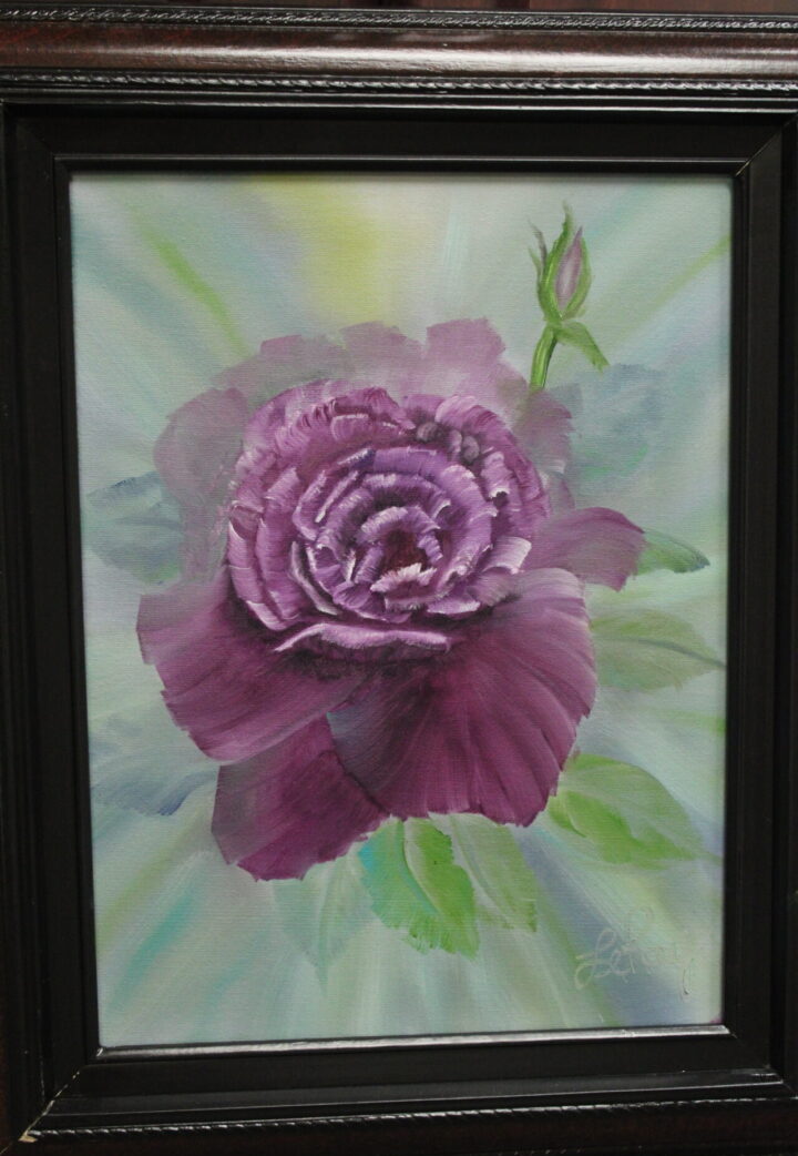 A Mauve Energy of a purple rose in a frame.
